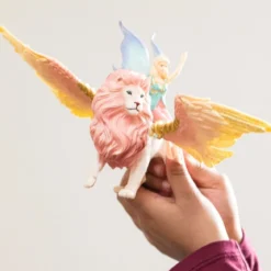 Elfe auf geflügeltem Löwe
